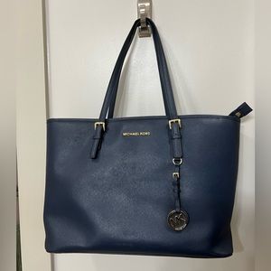Michael Kors Jet Set Saffiano Leather top zip bag